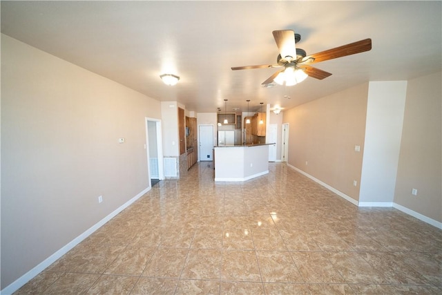 2033 Briarwood Dr, Corpus Christi, TX 78412 - unfurnished living room featuring ceiling fan and baseboards