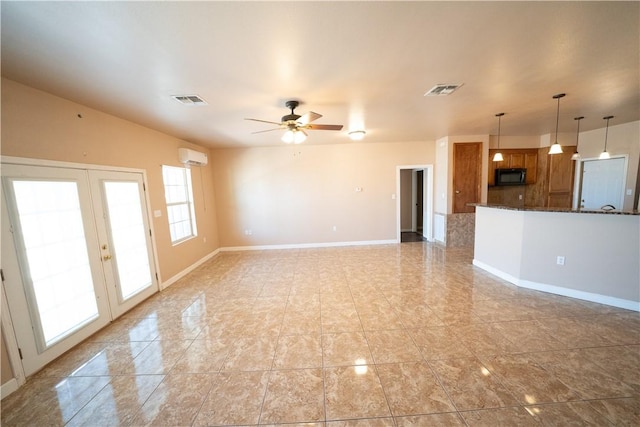 2033 Briarwood Dr, Corpus Christi, TX 78412 - unfurnished living room with french doors, ceiling fan, and light tile patterned floors
