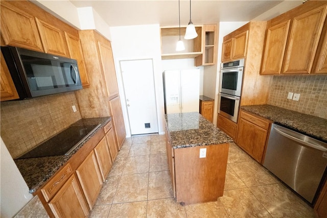 2033 Briarwood Dr, Corpus Christi, TX 78412 - kitchen with black appliances, a kitchen island, backsplash, and dark stone countertops