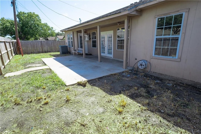 2033 Briarwood Dr, Corpus Christi, TX 78412 - fenced backyard with french doors and a patio