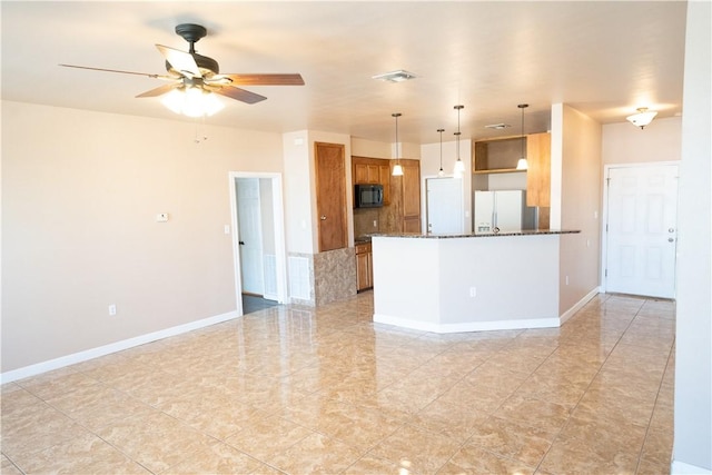 2033 Briarwood Dr, Corpus Christi, TX 78412 - unfurnished living room with a ceiling fan and baseboards
