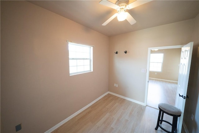 2033 Briarwood Dr, Corpus Christi, TX 78412 - spare room featuring light wood-style flooring, lofted ceiling, and a ceiling fan