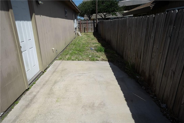 2033 Briarwood Dr, Corpus Christi, TX 78412 - fenced backyard featuring a patio