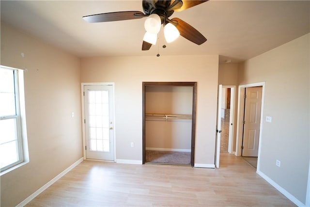 2033 Briarwood Dr, Corpus Christi, TX 78412 - unfurnished bedroom with light wood finished floors, a closet, and ceiling fan