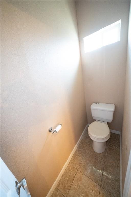 2033 Briarwood Dr, Corpus Christi, TX 78412 - bathroom featuring toilet and tile patterned flooring