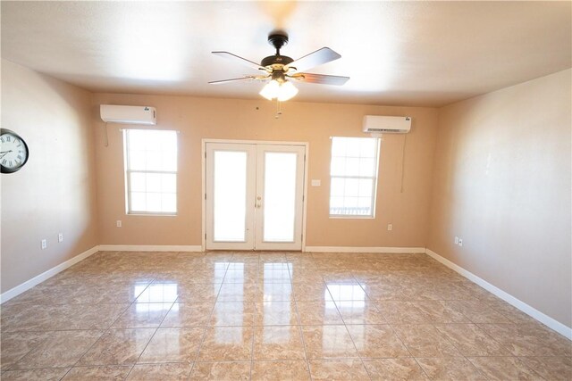 2033 Briarwood Dr, Corpus Christi, TX 78412 - empty room with a wall mounted AC, a ceiling fan, and french doors