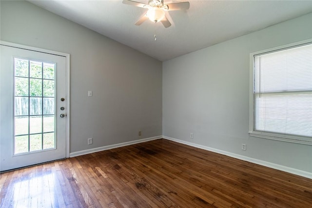 5933 Lucille Dr, Corpus Christi, TX 78412 - unfurnished room with vaulted ceiling, dark wood finished floors, and ceiling fan