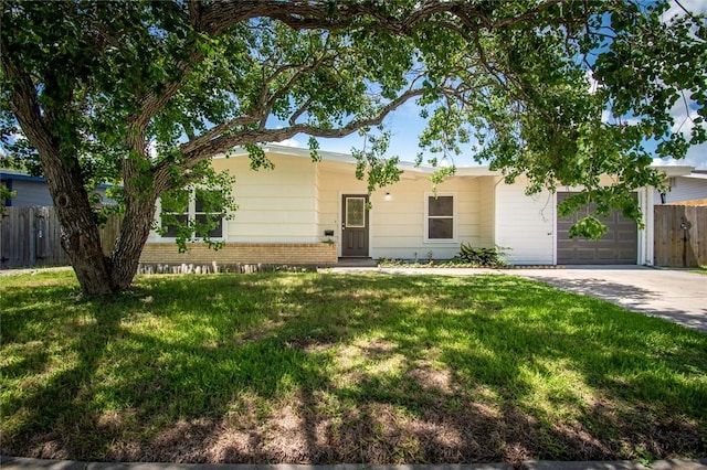 5933 Lucille Dr, Corpus Christi, TX 78412 - ranch-style house with a garage, concrete driveway, and brick siding