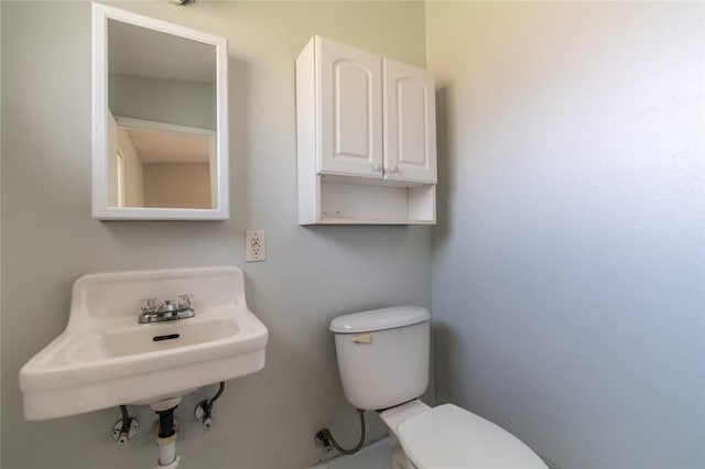 5933 Lucille Dr, Corpus Christi, TX 78412 - bathroom with toilet and a sink