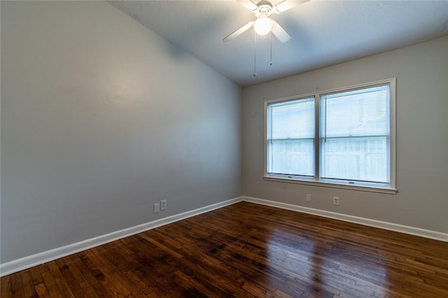 5933 Lucille Dr, Corpus Christi, TX 78412 - unfurnished room with dark wood finished floors, lofted ceiling, and a ceiling fan