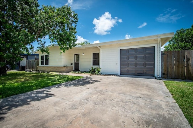 5933 Lucille Dr, Corpus Christi, TX 78412 - ranch-style house featuring a garage, concrete driveway, and brick siding