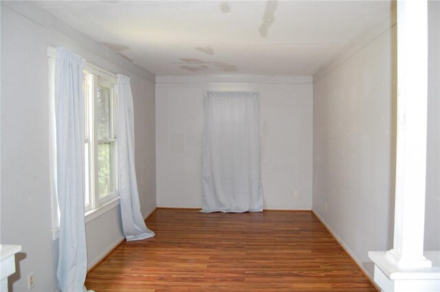 201 S Alta Vista St, Beeville, TX 78102 - empty room featuring wood finished floors