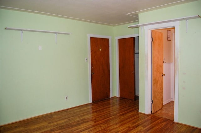 201 S Alta Vista St, Beeville, TX 78102 - unfurnished bedroom with wood finished floors