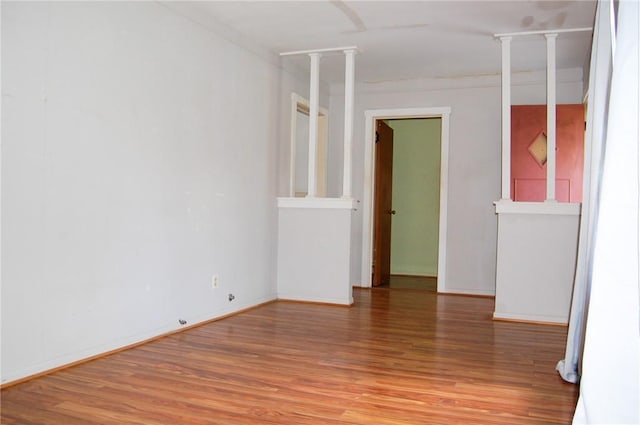 201 S Alta Vista St, Beeville, TX 78102 - empty room featuring light wood-style flooring
