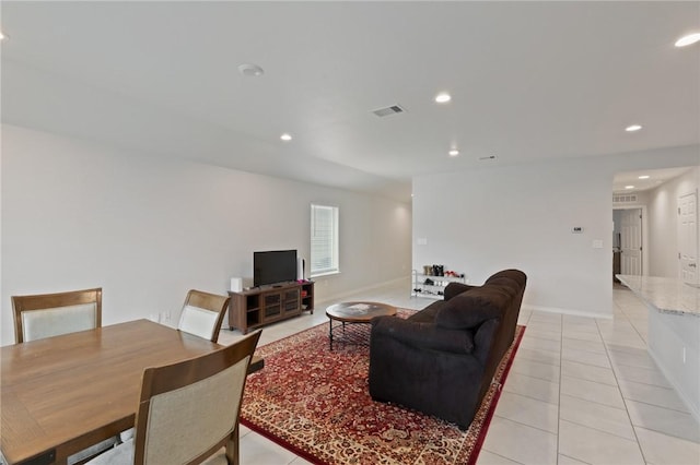 living room featuring light tile patterned floors