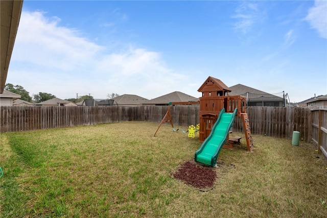 view of jungle gym with a yard