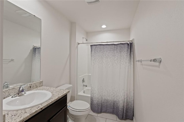 full bathroom with vanity, tile patterned flooring, toilet, and shower / bath combo with shower curtain