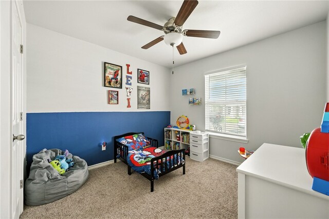 6758 Mikayla St, Corpus Christi, TX 78413 - carpeted bedroom featuring baseboards and a ceiling fan