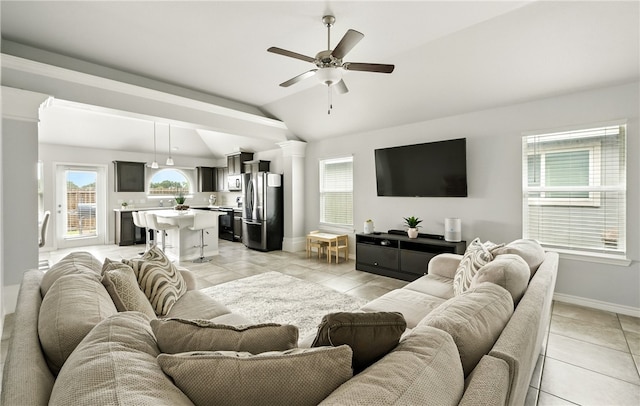 6758 Mikayla St, Corpus Christi, TX 78413 - living room with vaulted ceiling, a ceiling fan, and light tile patterned floors
