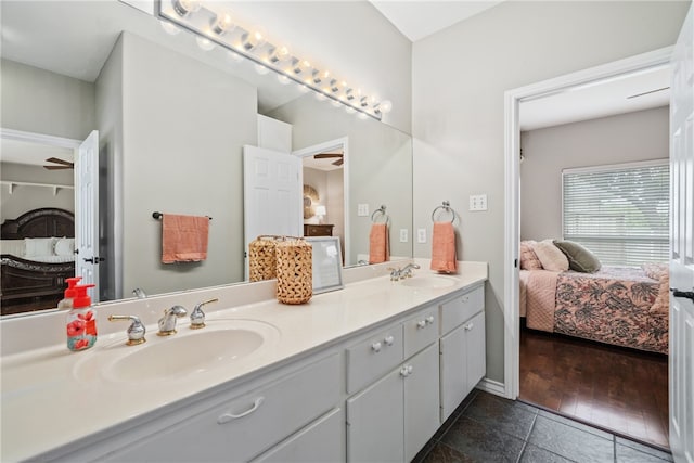 bathroom with vanity and hardwood / wood-style flooring