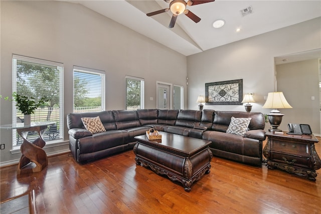 living room with high vaulted ceiling, hardwood / wood-style floors, and ceiling fan