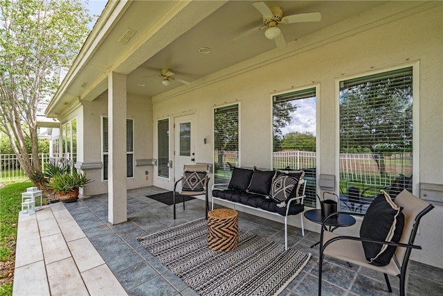 view of patio with ceiling fan