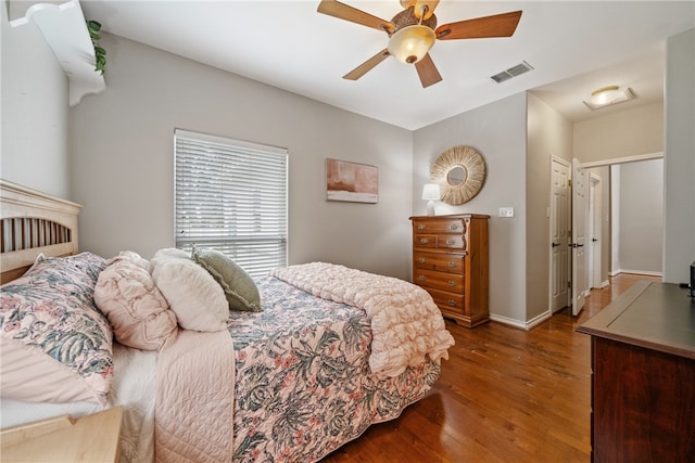 bedroom featuring hardwood / wood-style floors and ceiling fan