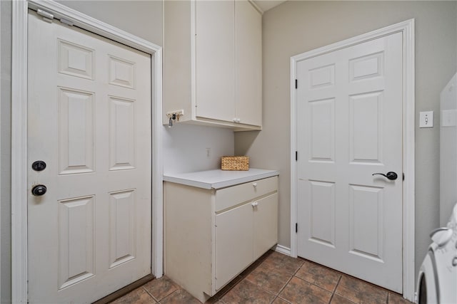 washroom with cabinets