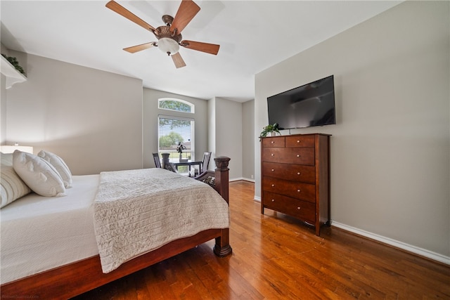 bedroom featuring hardwood / wood-style flooring and ceiling fan