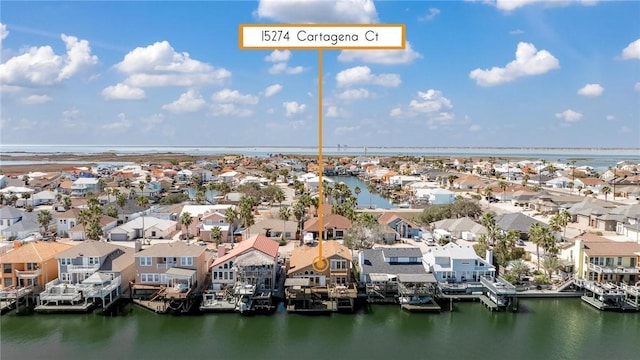 aerial view with a water view and a residential view