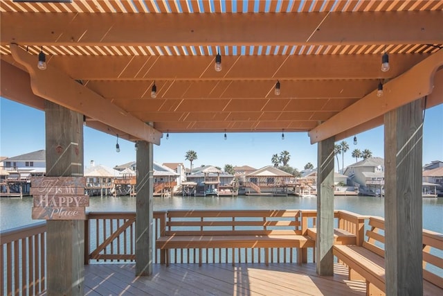 dock area with a water view