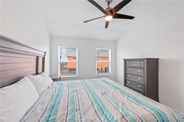 unfurnished bedroom featuring ceiling fan and vaulted ceiling