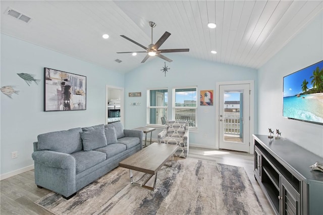 living room with ceiling fan, vaulted ceiling, light hardwood / wood-style flooring, and wooden ceiling