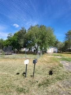 view of yard featuring a trampoline