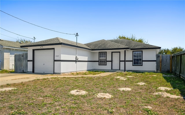 ranch-style home featuring stucco siding, concrete driveway, a garage, and fence