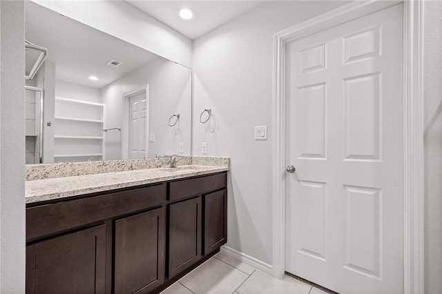3901 Jayden Dr, Corpus Christi, TX 78410 - full bathroom featuring vanity, tile patterned flooring, and baseboards