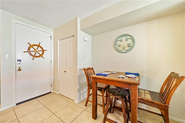 14514 E Cabana St, Corpus Christi, TX 78418 - dining area featuring light tile patterned floors and crown molding