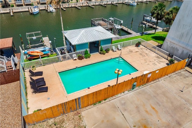 14514 E Cabana St, Corpus Christi, TX 78418 - community pool with a patio, a water view, and a dock