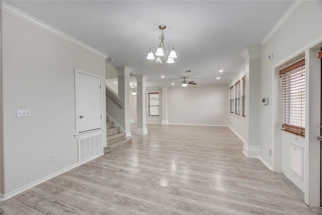 7706 Fort Griffen Dr, Corpus Christi, TX 78414 - unfurnished living room featuring ornamental molding, ceiling fan, a chandelier, light wood-type flooring, and stairs