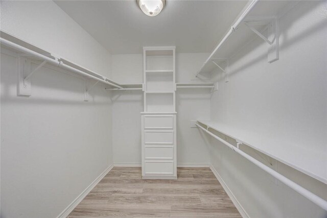 7706 Fort Griffen Dr, Corpus Christi, TX 78414 - spacious closet featuring wood finished floors