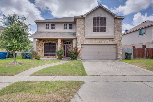 7706 Fort Griffen Dr, Corpus Christi, TX 78414 - traditional-style house with an attached garage, concrete driveway, and stone siding