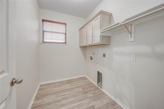 7706 Fort Griffen Dr, Corpus Christi, TX 78414 - laundry room with electric dryer hookup, washer hookup, light wood-type flooring, and baseboards