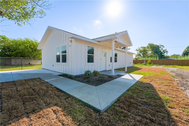 rear view of property with a patio area