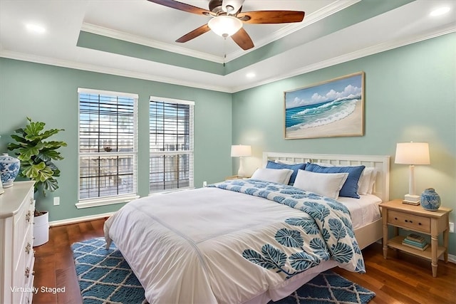15341 Yardarm Ct, Corpus Christi, TX 78418 - bedroom with dark wood-style flooring, ornamental molding, a raised ceiling, recessed lighting, and a ceiling fan