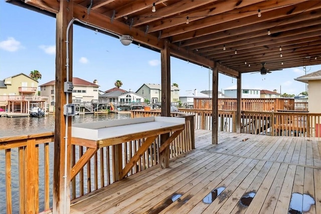15341 Yardarm Ct, Corpus Christi, TX 78418 - deck with a residential view, a water view, and ceiling fan