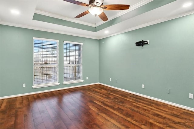 15341 Yardarm Ct, Corpus Christi, TX 78418 - unfurnished room with dark wood-style flooring, ceiling fan, a raised ceiling, ornamental molding, and recessed lighting