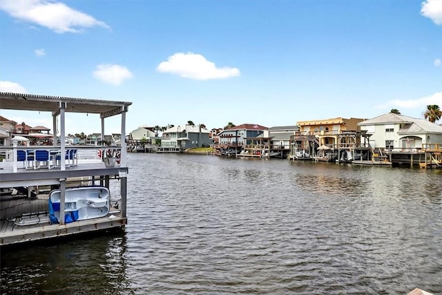 15341 Yardarm Ct, Corpus Christi, TX 78418 - dock area with a residential view, a water view, and boat lift