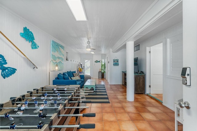 interior space featuring visible vents and a ceiling fan