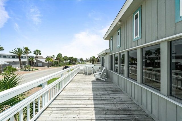 wooden deck featuring a residential view