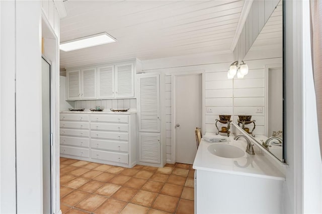 bathroom featuring tile patterned floors and vanity